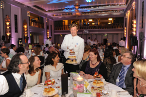 Guests enjoy an afternoon tea at the Cake Awards 2013